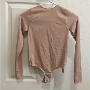 Skims long sleeve thong nude bodysuit